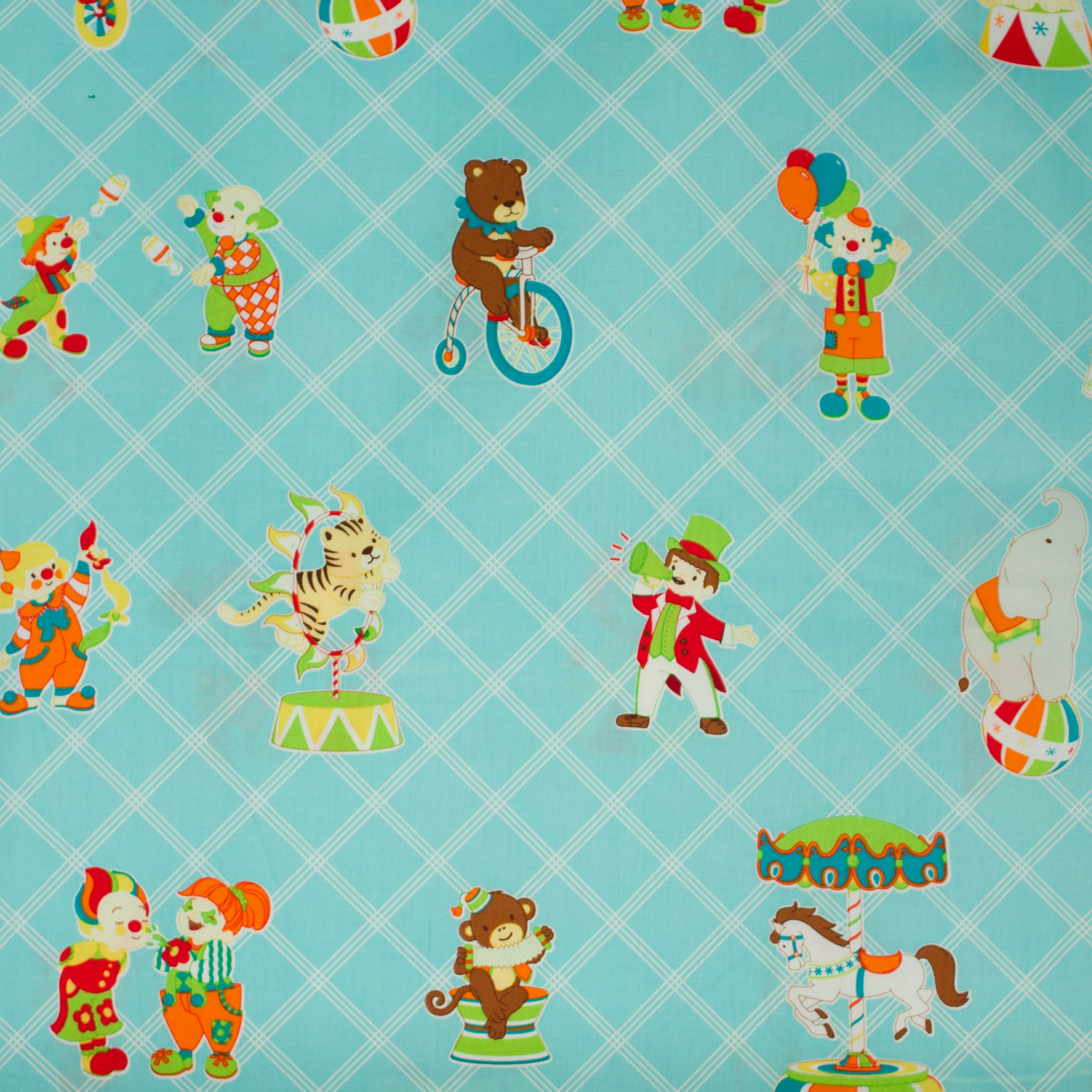 Katoen blauw met circusfiguren